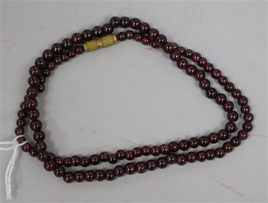 A red coloured bead necklace, 40cm.